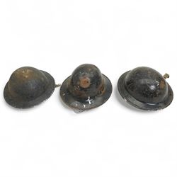 World War II Zuckerman Civil Defence helmet and two other WWII steel helmets