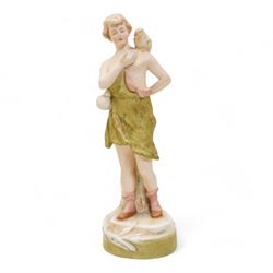 Pair of Royal Dux male and female figures holding doves, H24cm and smaller and a Royal Dux figural planter, modelled as a young shepherdess with lambs, H18cm (3)