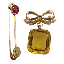 Gold citrine pendant brooch and a gold two stone set brooch, both 9ct stamped or hallmarked