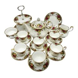 Royal Albert Country Roses pattern tea service for six, comprising Teapot, open sucurer, milk jug, cups and saucers, dessert plates and cake stand 