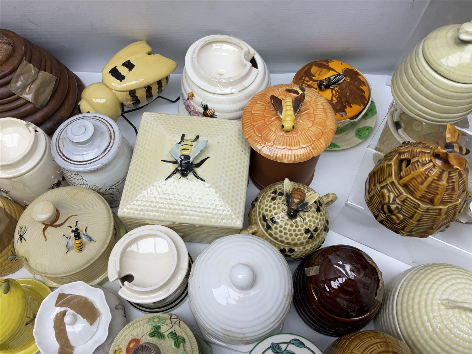 Large collection of honey pots, of various shapes, to include examples from Crown Devon, Marutomo ware, W.H Gloss, Goebel etc 