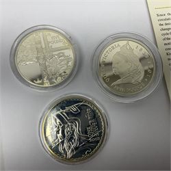 Thirteen silver coins, including Queen Elizabeth II Solomon Islands 2002 sterling silver five dollars, Alderney 2002 sterling silver five pounds, Fiji 2002 sterling silver ten dollars, United Kingdom 2003 one ounce fine silver Britannia, 2003 'Give Women The Vote' fifty pence etc, all with some form of certificate