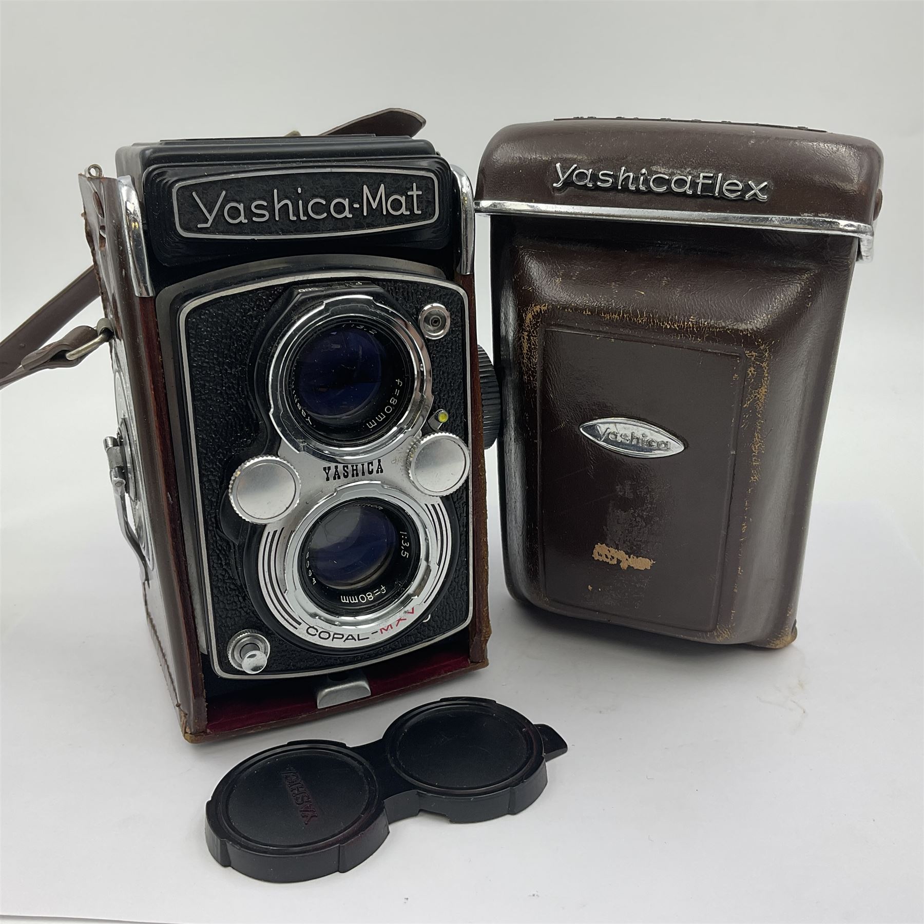Yashica-Mat Copal MXV camera body, serial no 408717, with Yashinon 1;3.2 f=80mm' and Yashinon 1;3.5 f=80mm' lens serial no 460802, together with Yashica 635 Copal-MXV camera body serial 4080675 with Yashinon 1;3.5 f=80mm' lens serial no 229427 and 'Yashikor 1;3.5 f=80mm' lens serial no 228386