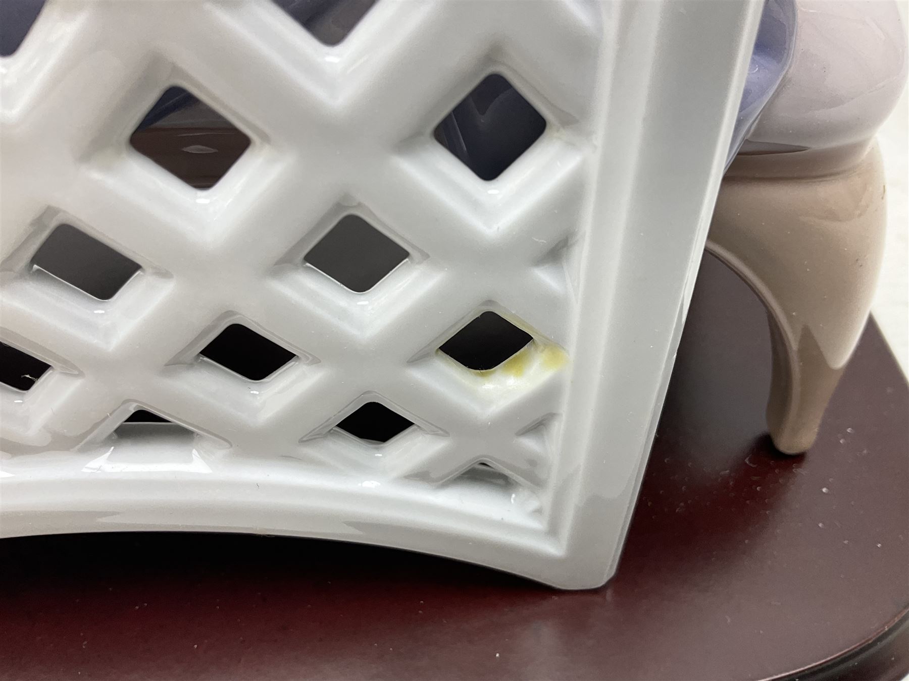 Lladro figure, Garden of Dreams, modelled as a woman reclining in front of trellis of flowers on a mahogany base, limited edition 3129/4000, sculpted by  José Puche, with original box, no 7634, year issued 1994, year retired 1996, H32cm