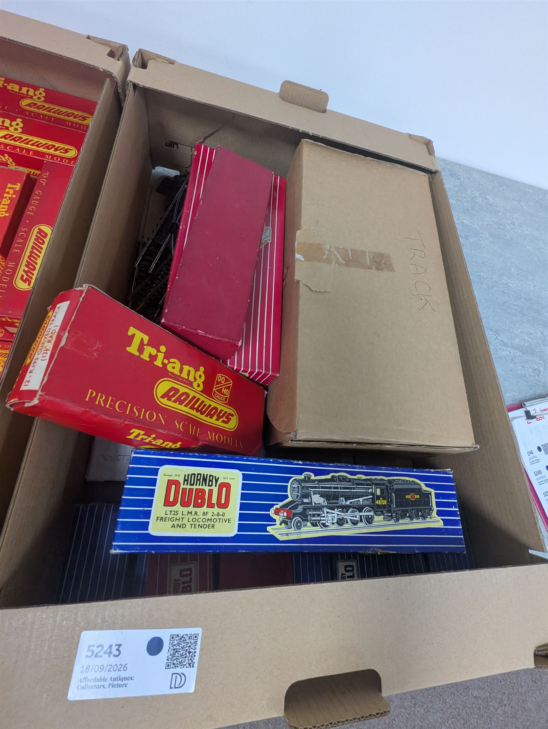 Collection of 00 gauge Hornby Dublo and Triang rolling stock, including one steam locomotive, two diesel shunters, breakdown crane, wagons, track and other accessories, mostly boxed, in three boxes