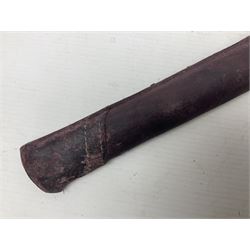 Copy of a WWII Japanese NCO sword, the 65cm slightly curving blade stamped with pseudo Japanese characters and cast brass simulated cord bound grip; in officer's leather bound field scabbard L97cm overall