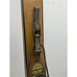 Pair of 1930s wooden skis, with painted metal runners beneath stamped Attenhofer, with retailers label for Ernst Gertsch Central Sports, L206cm