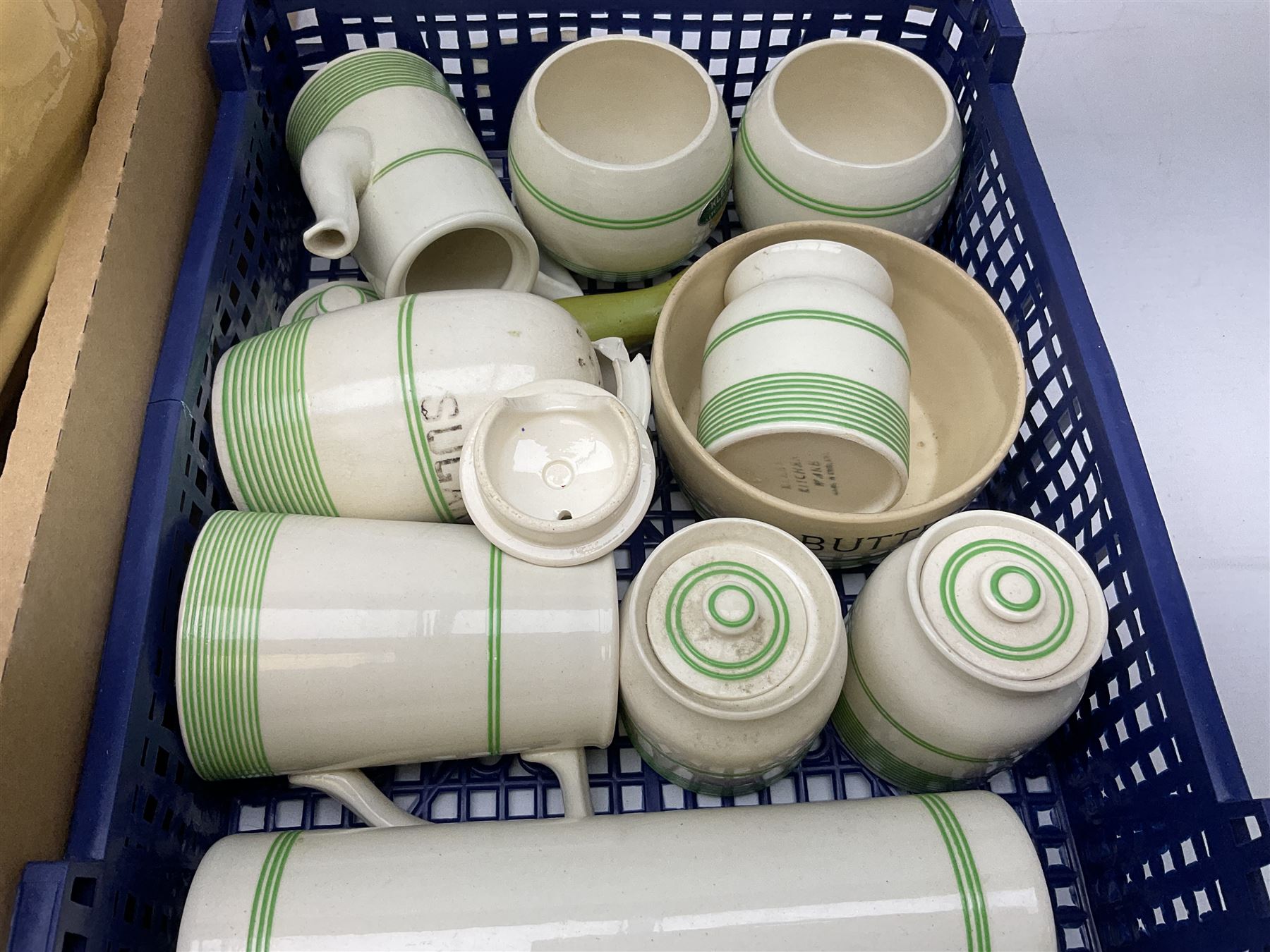 Sadler Kleen Kitchen Ware decorated with green stripes, together with