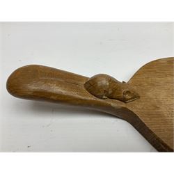 Mouseman - oak kidney-shaped cheeseboard, the handle caved with mouse signature, by the workshop of Robert Thompson, Kilburn
