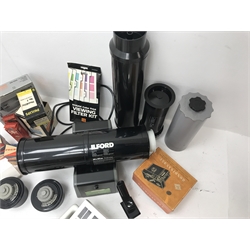 Large quantity of photo developing, dark room and photography equipment - quantity of Fogro 2'' x 2'' slide frames, PHILIPS movielight PSG125, Paterson 2 print forceps, atlas photo flash M3 clear, two Paterson 35mm developing tanks, Ilford photography paper 12'' x 16''and 8'' x 10'', Fujifilm photography paper 8'' x 10'' and 12'' x 16'', Rondinax 35U developing tank boxed, Simma Roller, two Ilford processing drums 30x40cm and 20x25cm, two other processing drums, Paterson 35mm contact proof printer, S&K 60D-C colour analyser etc... in three boxes