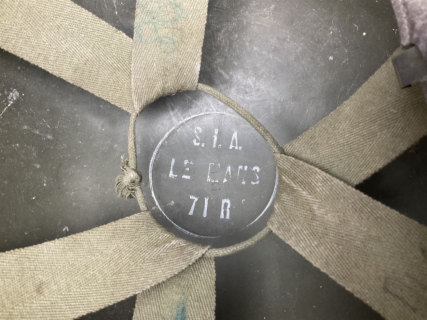1950s French Algerian War steel helmet with liner; indistinctly marked 'S.I.A. LE EANS(?) 71R'