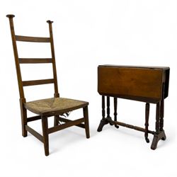 Attributed to William Birch of High Wycombe - Arts & Crafts oak ladder-back side chair, with turned finials, rush seat, and stretchers, raised on square-section supports; 19th century mahogany Pembroke table, rectangular drop-leaf top raised on turned supports with central stretcher and splayed feet