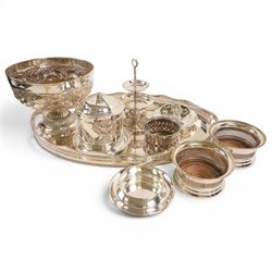 Set of twelve silver plate place holders, with grapes to the front, together with three bo...