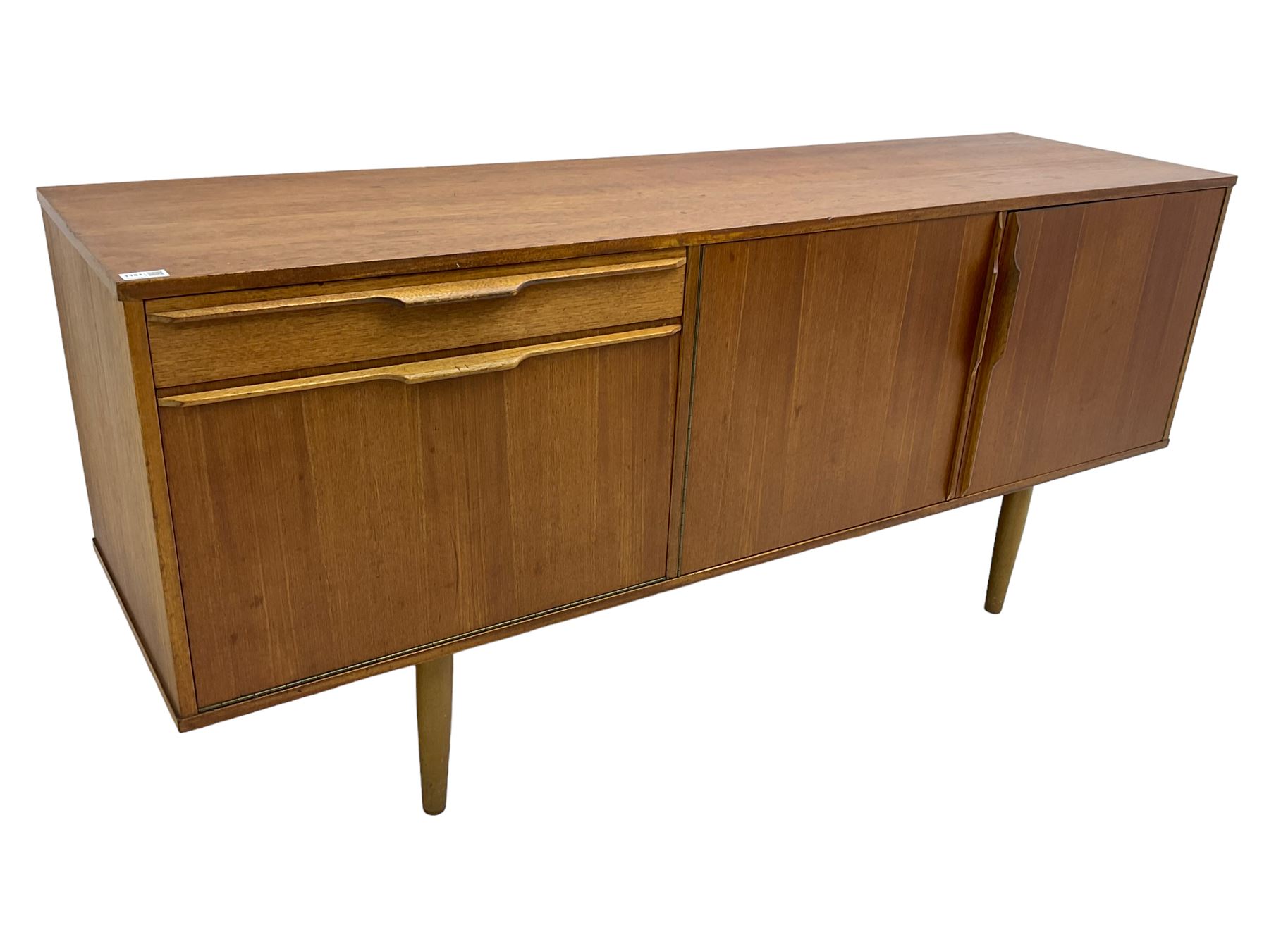 Morris of Glasgow - mid-20th century teak sideboard, fitted with double cupboard and single drawer above fall-front cabinet, raised on tapering supports
