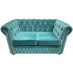 Sofas by Saxon - Chesterfield shape two-seat sofa, upholstered in buttoned aqua blue velvet fabric