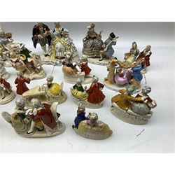 Seventeen Grafenthal porcelain figure groups, all modelled as pairs of lovers in various poses, some with impressed and printed marks beneath, largest example H20cm