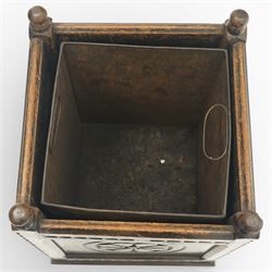 20th century carved fireside accessories; a carved coal bucket with metal liner and a carved fire screen