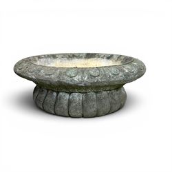 Collection of cast stone garden ornaments - three figure bird baths, figure on plinth, seated lion, lion, boy figure, and stone trough (9)