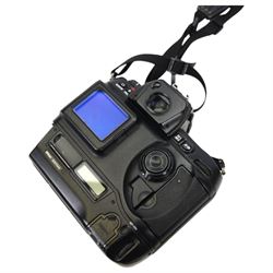 Nikon D1H digital SLR camera body serial no. 5207443, together with a Nikon D5100 digital camera body serial no. 6102034, with some associated battery packs and accessories