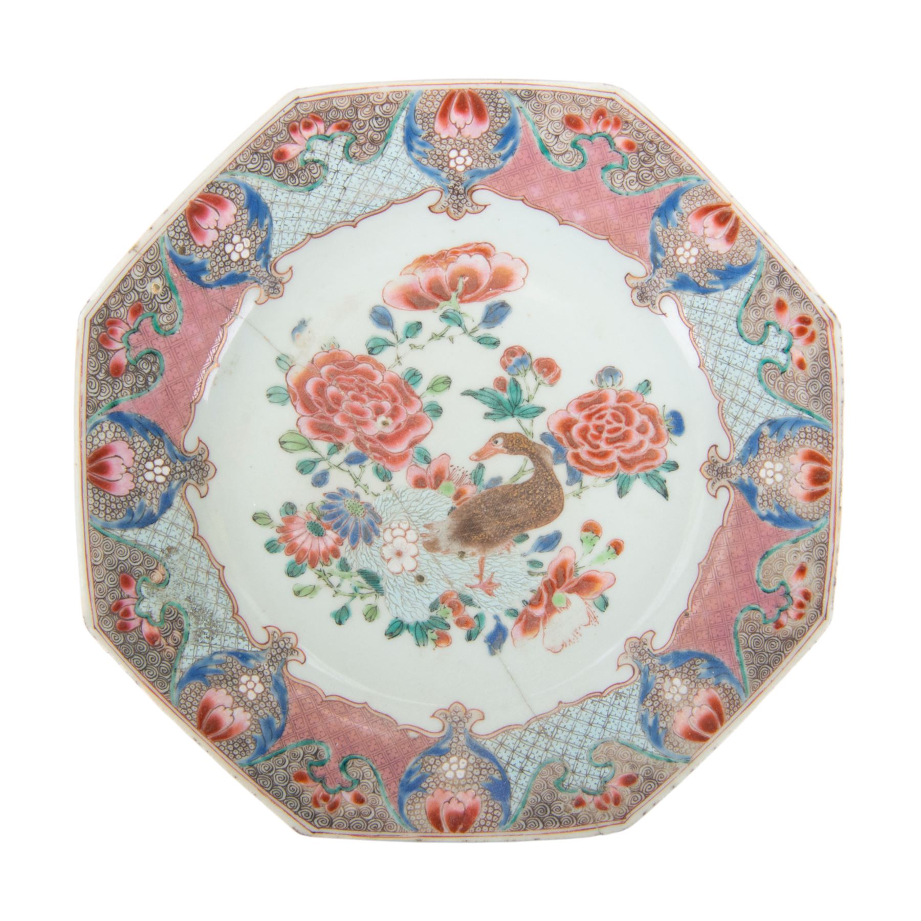 Yongzheng Period, octagonal famille rose plate decorated with duck amongst blossoming peonies, within a boarder of pomegranate shaped cartouches against a trellis platter, reverse decorated with four lingzhi, D23cm
