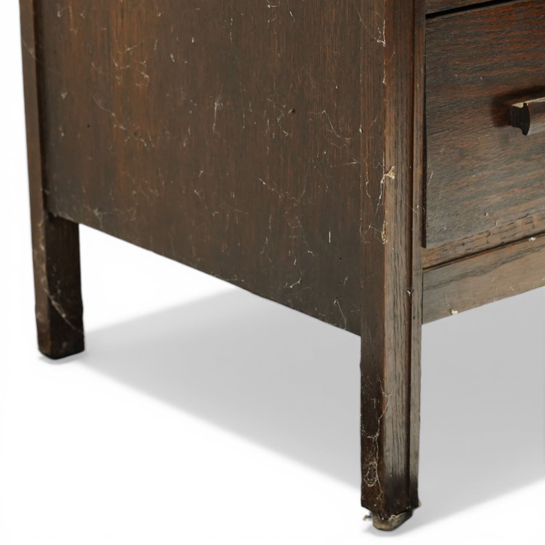 Edwardian tall oak chest fitted with six long drawers, on stile supports