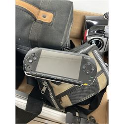 Sony Playstation PSP console with charger, Miranda 10x50 binoculars in bag, Praktica MTL3 camera, Miranda 630 CD flash, Carl Zeiss Jena Tessar lens, Sirius 1:3.5-4.5 f+28-70mm lens, digital camera in bag etc