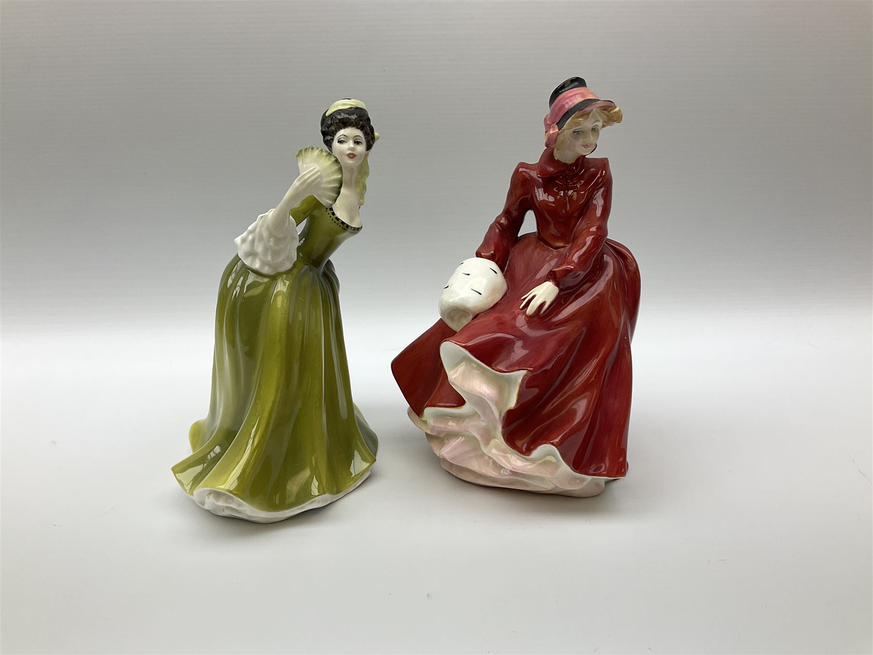 A group of eight Royal Doulton figures, comprising Simone HN2378, Amy HN3854, Fragrance HN2334, Louise HN3207, Adrienne H2304, Michele HN2234, Fine Lady HN2193, Winsome HN2220 and a Coalport figure, Polly. 
