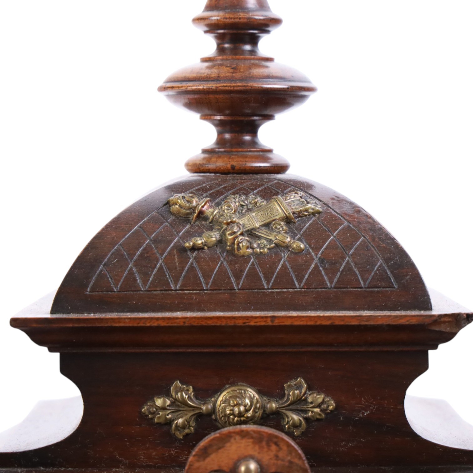 Junhgans eight-day cased mantle clock, with a square etched dial and Roman Numerals, a carved ogee pediment and turned finials, on a broad blinth with bun feet, H49cm