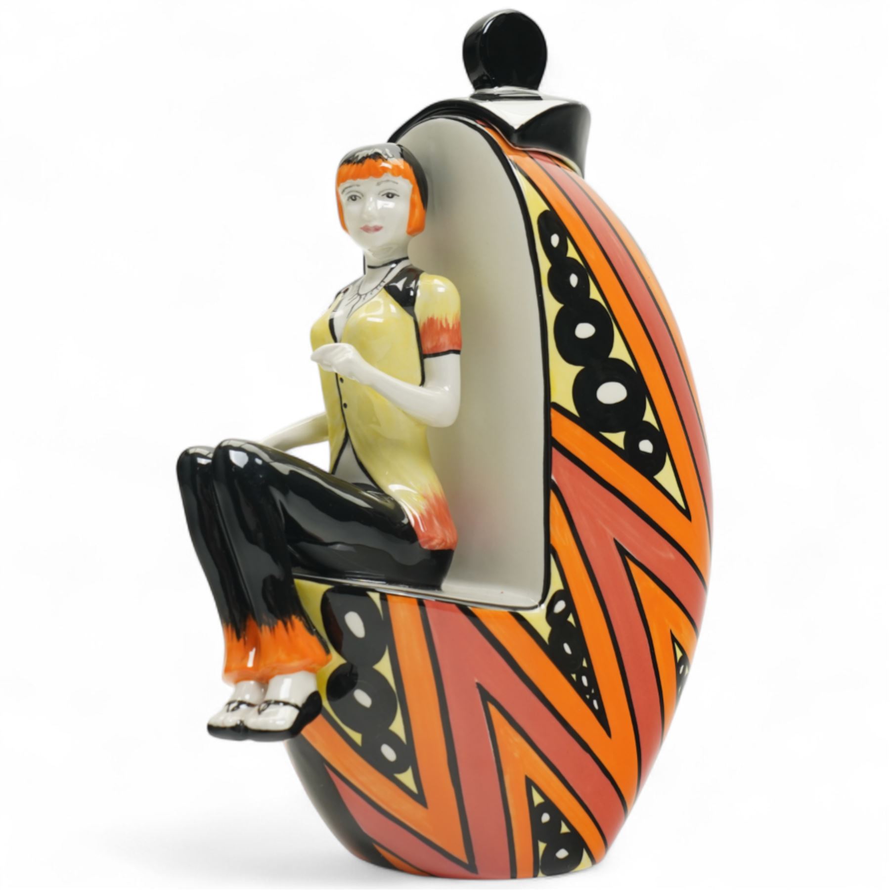 Lorna Bailey limited edition Deco lady figure, modelled as seated on covered pot, with geometric painted striped and spotted decoration, signed and numbered 12/50 to base, H25cm 