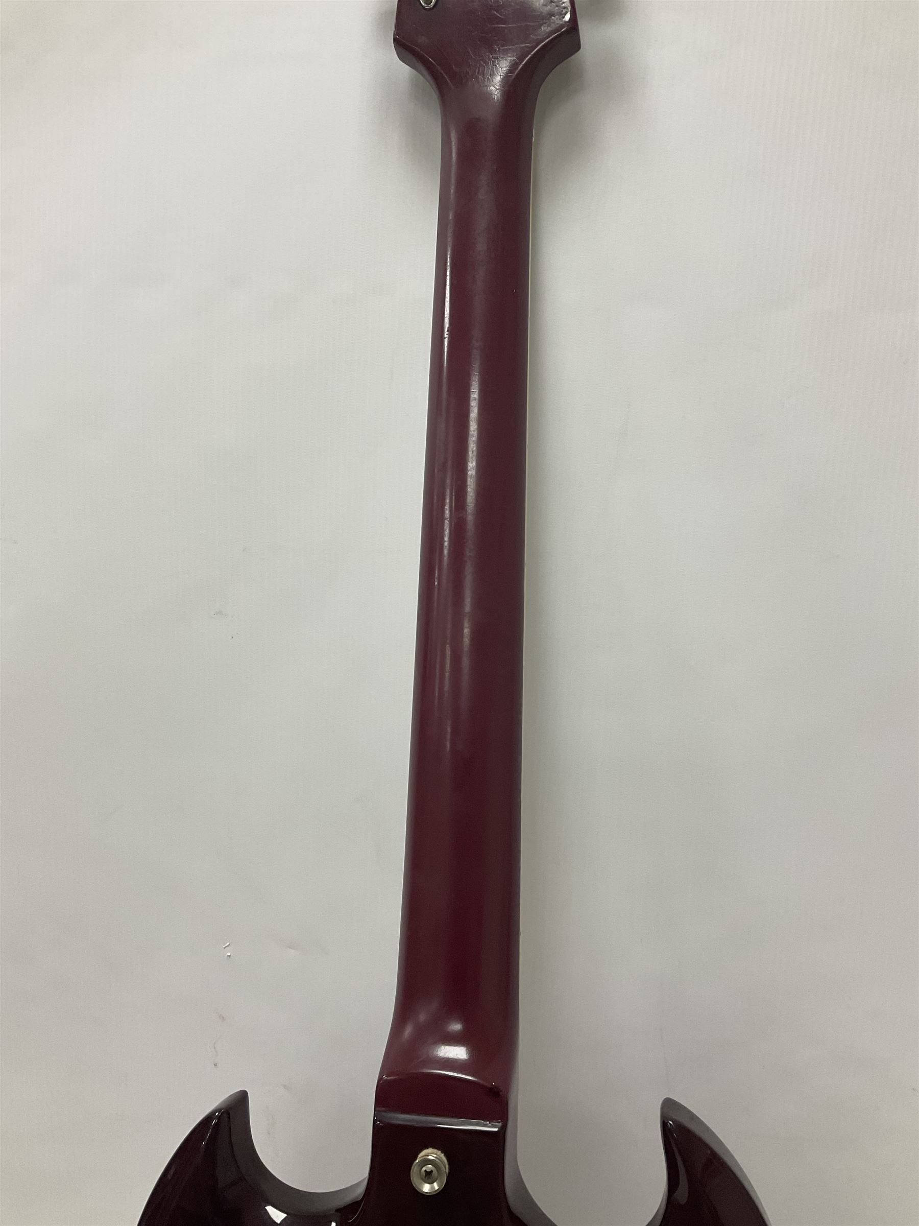 Gibson Epiphone SG six string electric guitar, with cherry red mahogany finish and black scratch guard, L102cm