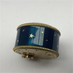 Bueche Girod silver-gilt and enamel novelty miniature clock, with a band of gilt moon and star decoration upon a deep blue enamel ground, with enamel and gilt foliate dial, with musical mechanism playing happy birthday, D2.7cm, in suede pouch