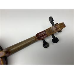 Late 19th century French three-quarter size 'Conservatory' violin with 34cm two-piece maple back and ribs and spruce top, the peg box inscribed 'Conservatory Violin Straduari', bears label 'Antonius Stradiuarius Cremonensis Faciebat Anno 1721' L55.5cm overall; in ebonised wooden 'coffin' case; and Saxony violin c1900 with 36cm two-piece maple back and ribs and spruce top; bears label 'Antonius Stradivarius Cremonensis Faciebat Anno 17**' L59cm overall; in carrying case (2)