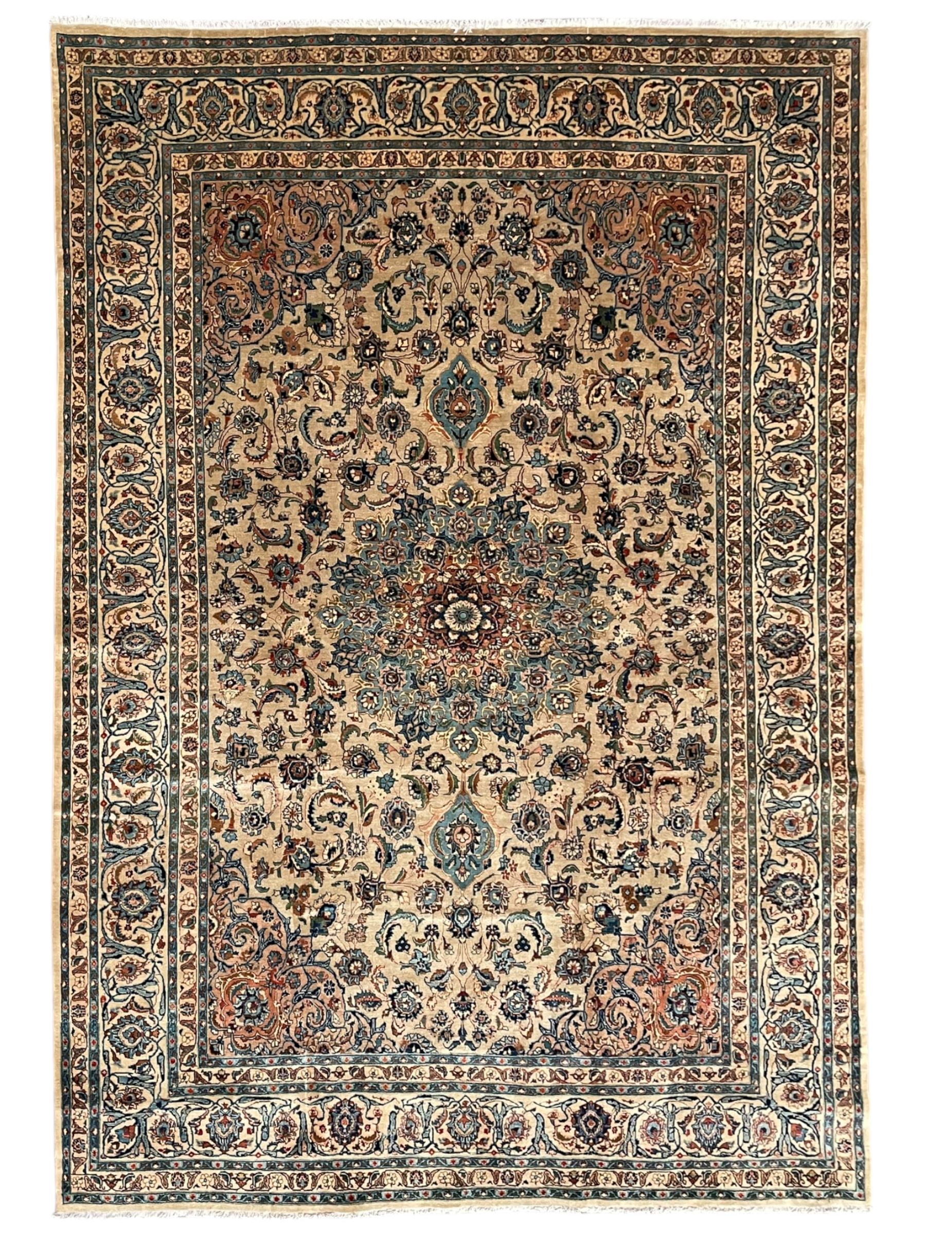 Persian Kashmar camel ground carpet, palmette rosette medallion on a field of curling leafy branches and stylised plant motifs, scrolling border decorated with further palmettes, within floral pattern guard stripes
