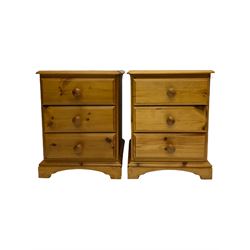 Two modern pine double wardrobes, two three drawer bedside chests and a pine dressing table