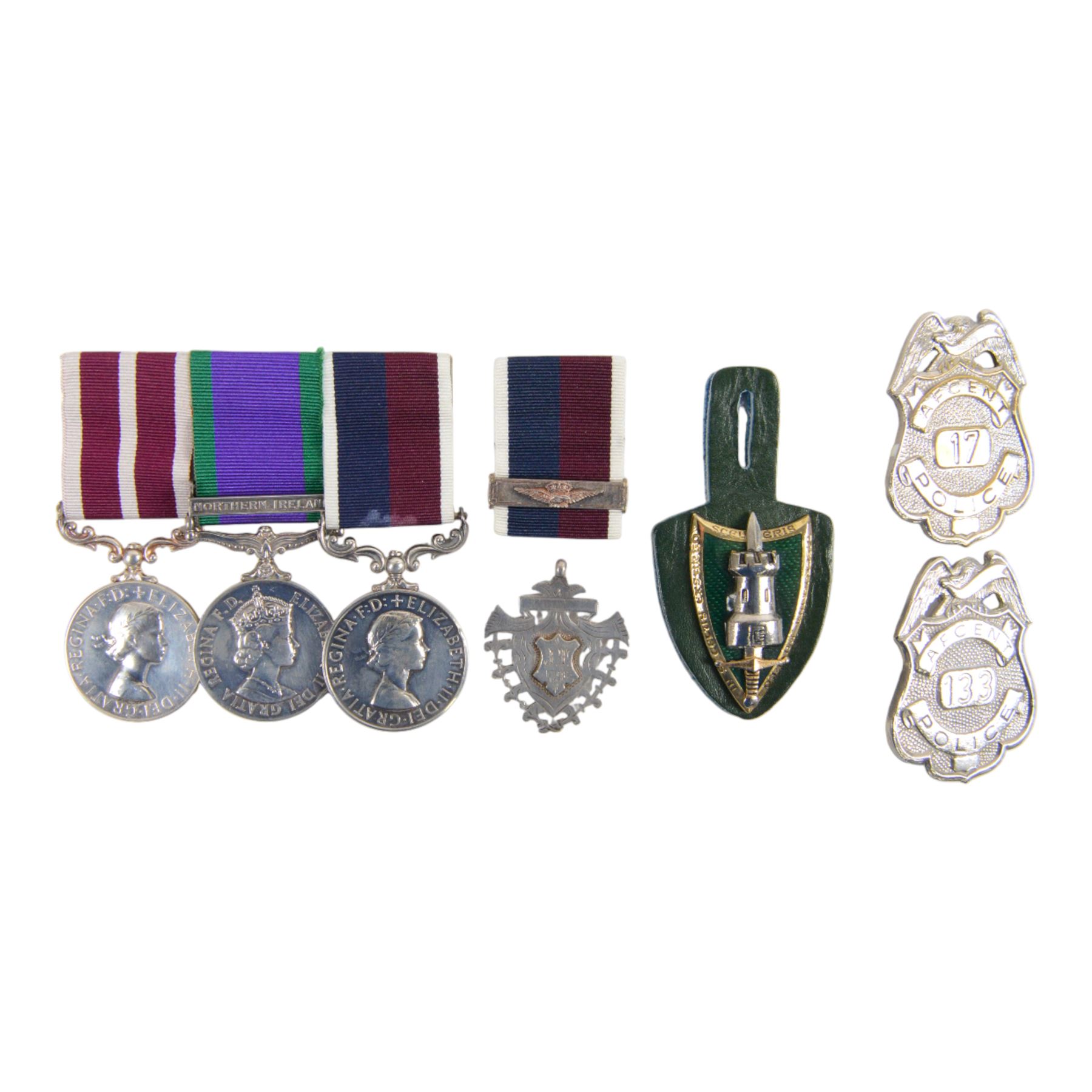 ERII RAF medal trio, Meritorious Service, Campaign Service, with Northern Island clasp, and Long Service, awarded to JJ Taylor (65082068) RAF together with AFCENT breast tab and police badges