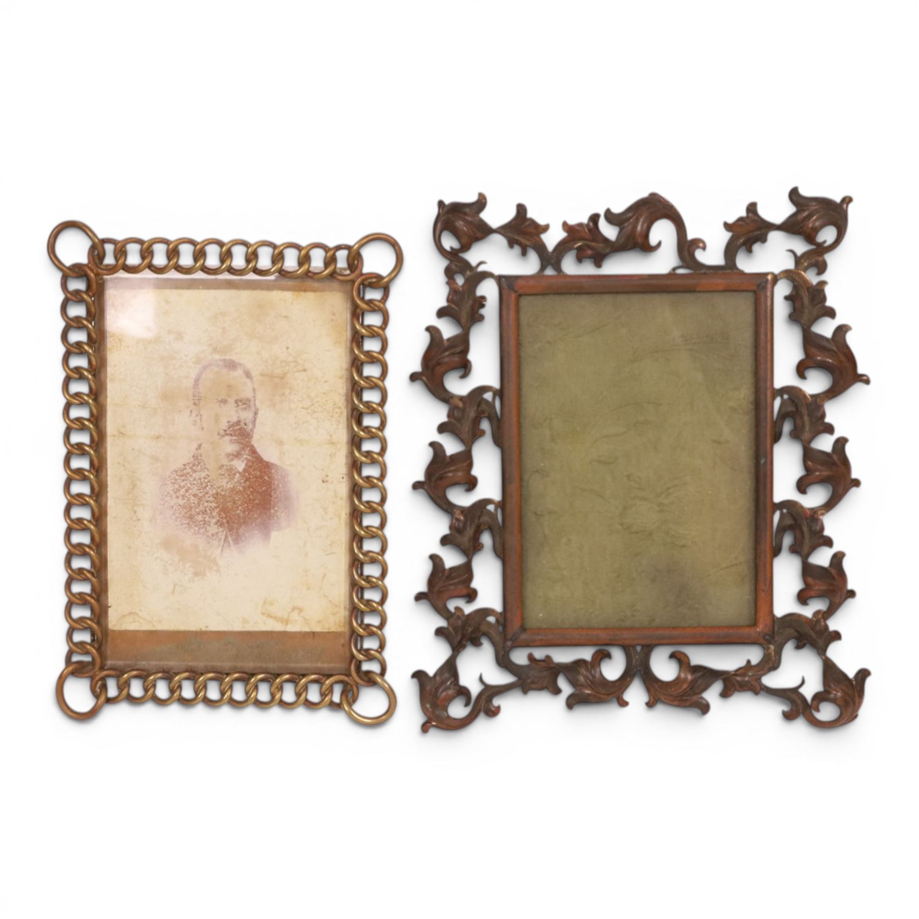 19th Century gilt metal photograph frame of easel form with Rococo scroll decoration, together with three brass link frames, largest H22cm 