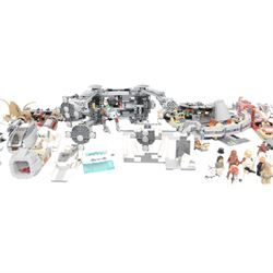 Collection of partially built Lego Star Wars models, including Motorized Walking AT-AT no. 10178, Hyena Droid Bomber no.8016, Emperor Palpatines Shuttle no. 8096, Jabbas Palace no. 4480 and Millennium Falcon no. 4504, etc together with a quantity of Lego Star Wars minifigures, loose parts and instruction booklets for Lego Star Wars sets