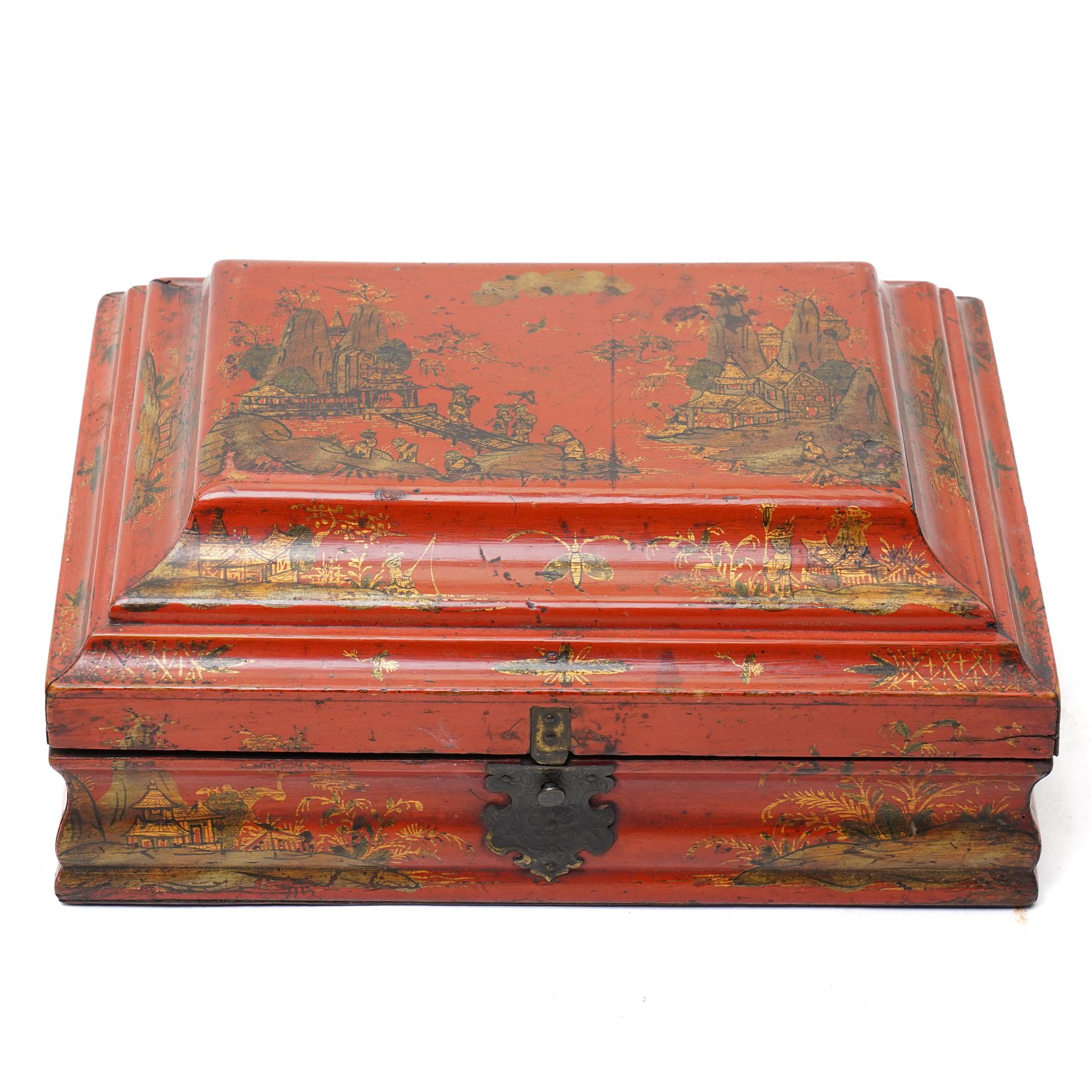 Early 19th century red lacquered chinoiserie box, painted with a traditional landscape scene and heightened in gilt, with original metal fastenings and hinges, W29cm 