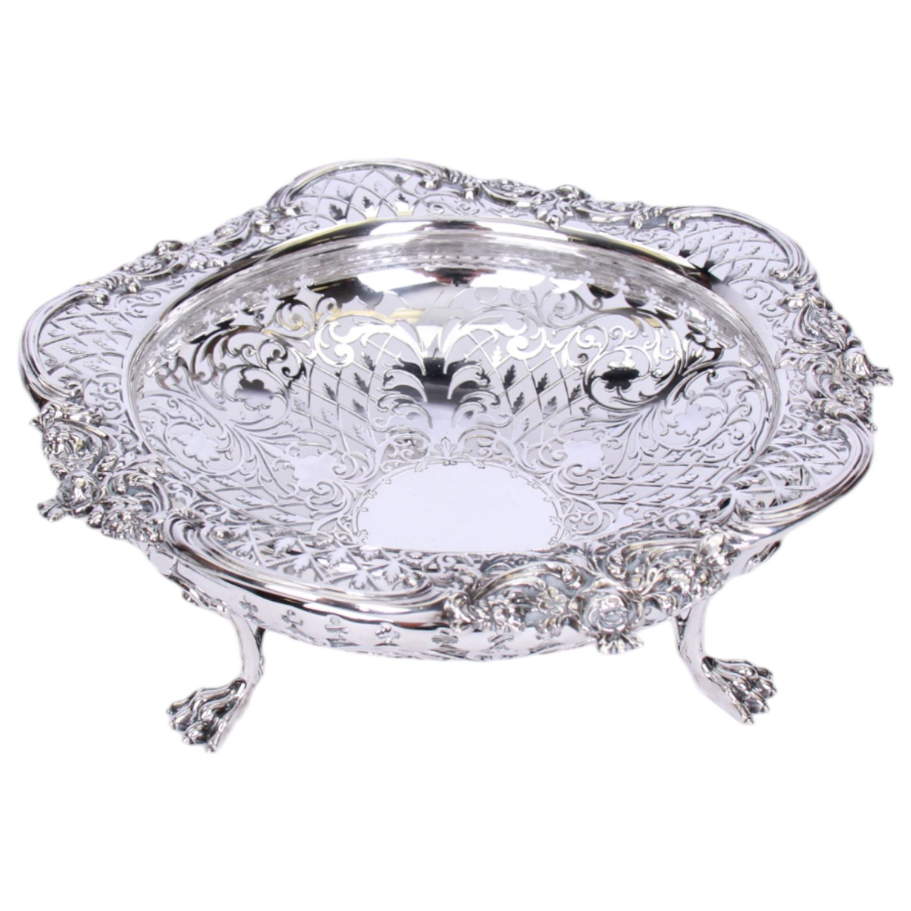 Early 20th century pierced silver bowl, of circular form with shaped rim with C scroll and foliate edge, the whole profusely pierced, upon three paw feet, hallmarked James Dixon & Sons Ltd, Sheffield 1916, H9cm D22.5cm