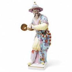 Pair of Continental polychrome Chinese male and female standing figures wearing floral robes H42cm