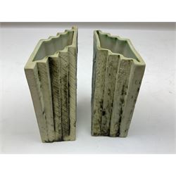 Pair of Carn Pottery Penzance vases of fan form, with tube lined floral and stylised decoration, stamped and marked X9 to base, H11.5cm