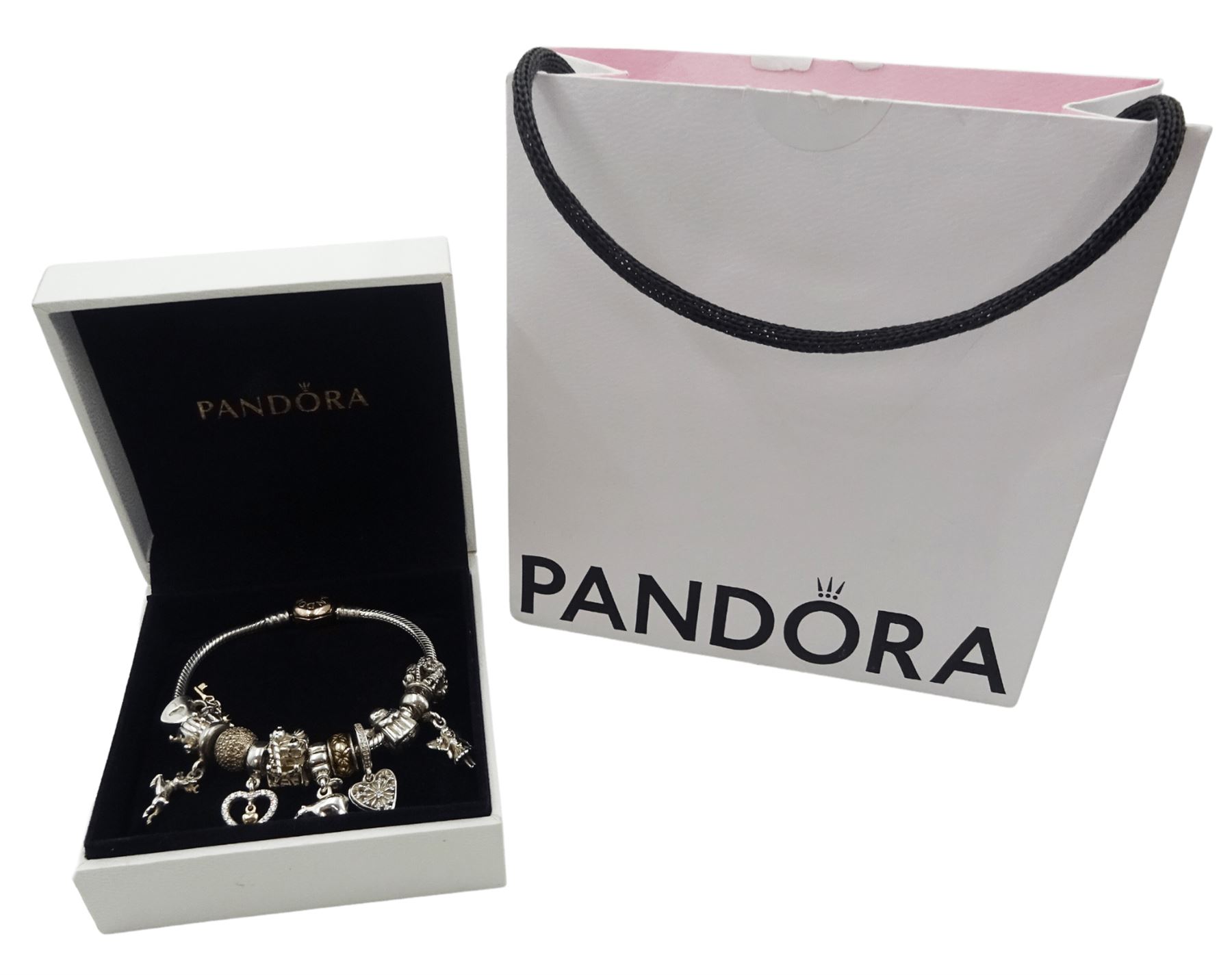 Silver Pandora bracelet with 14ct gold plated heart clasp, with twelve Pandora charms, including Santa's sleigh, Christmas elves, reindeer, fairy, snowflake and polar bear, some with 14ct gold plated accents, with Pandora box and bag