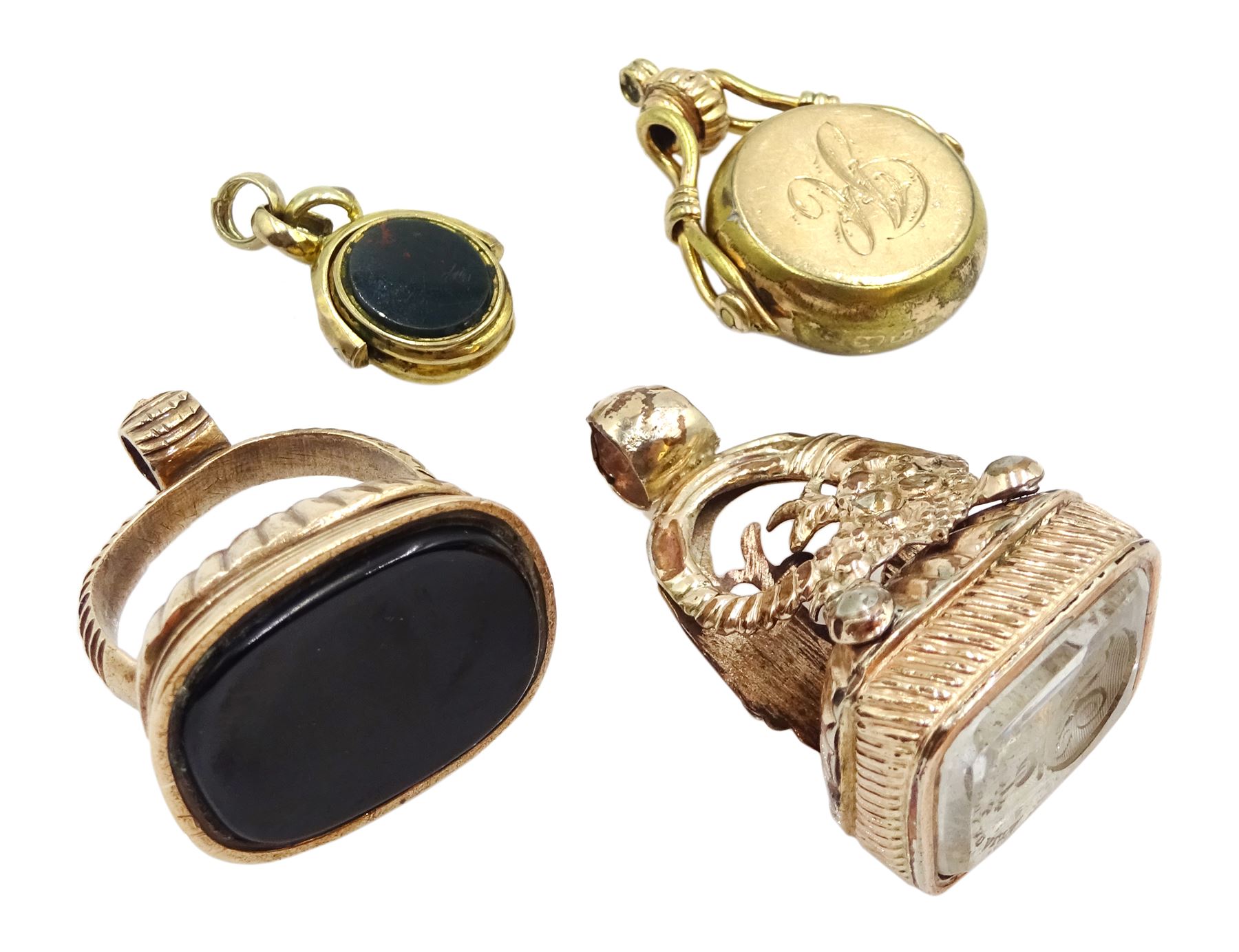 Victorian gilt crystal seal fob, engraved with initials HP, one other jet fob, gilt bloodstone swivel fob and and one other agate and bloodstone (4) 
