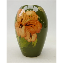  Moorcroft 'Hibiscus' pattern baluster shaped vase on green ground, H11cm  