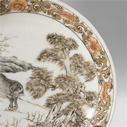 Chinese Yongzheng period saucer, finely painted in grisaille with buffalo within a rocky landscape, the inner rim with iron red and gilt foliate band, D11.5cm