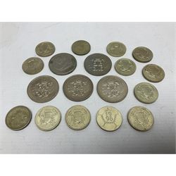 Five Queen Elizabeth II five pound coins and thirteen old style two pound coin