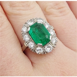  Platinum emerald cut emerald and diamond cluster ring, stamped Plat  