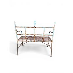 Regency period wrought iron strapwork garden bench, cresting rail with central Scottish thistle motif and flanking pediments, in distressed blue painted finish