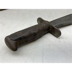 US Model 1910/17  Machine Gunners Bolo knife, the 26.5cm curving steel blade marked 'US MOD 1917 PLUME PHILA 1918'; in webbing covered steel scabbard with leather chape marked 'Brauer Bros 1918' L40.5cm overall (with photocopy of modern reference material)