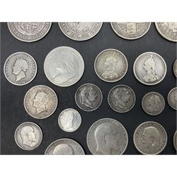 Approximately 145 grams of Great British pre 1920 silver coins, including George III 1817 halfcrown, Queen Victoria Gothic florin, 1887 halfcrown, King Edward VII 1907 standing Britannia florin etc
